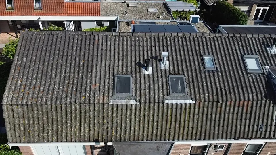 Aerial view of the tiled roof before renovation in Zwaanshoek